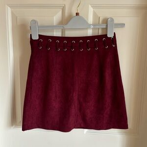 Indikah burgundy mini skirt.